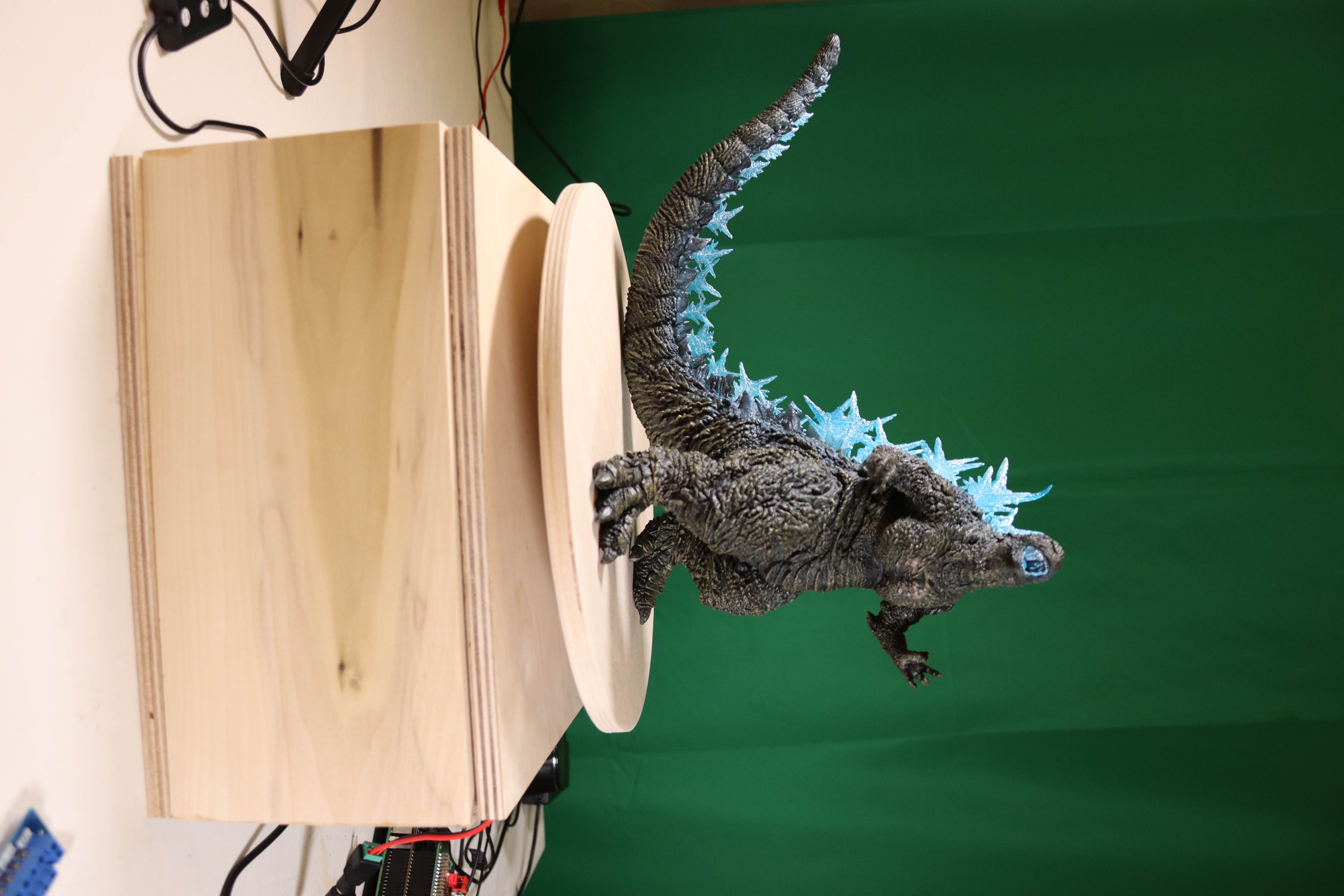 KineMachina device with a kaiju figure mounted