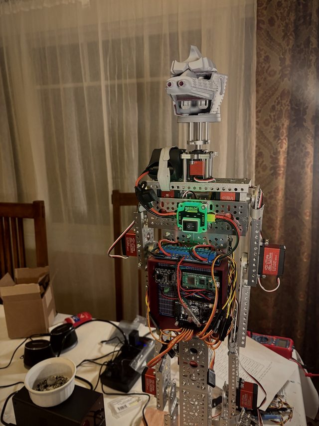 The early MechaGodzilla skeleton: an aluminum frame with the head on top and a green-lit chest board